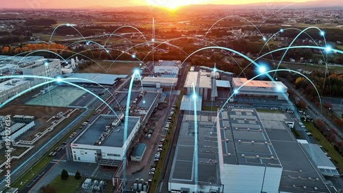 Composited image of drone aerial view of modern industrial area and communication network concept.