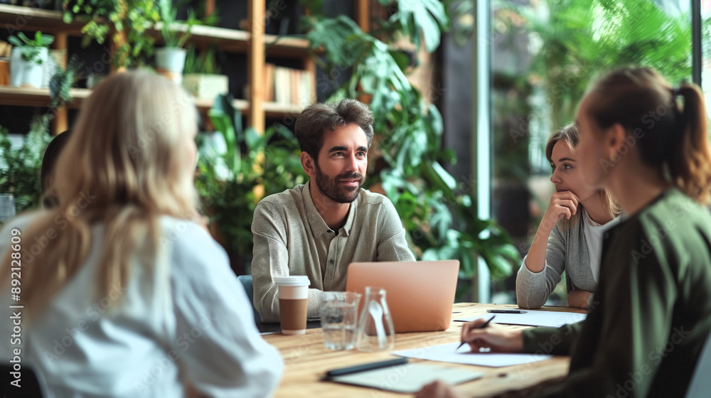 A team of diverse professionals engaged in a productive meeting at a modern, plant-filled workspace. A team gathered around a table, with the leader listening intently. Generate ai illustration. A team of diverse professionals engaged in a productive meeting at a modern, plant-filled workspace. A team gathered around a table, with the leader listening intently. Generate ai illustration.