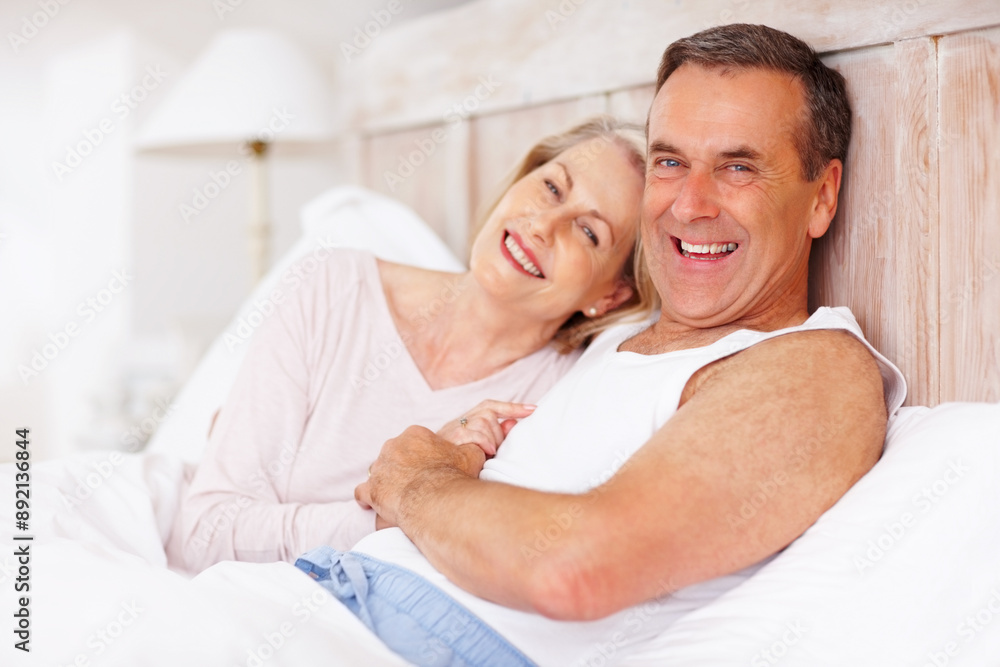 Mature couple, happy and portrait in bed at house for relax, love and retirement together with trust and care. Man, woman and face in bedroom for marriage, loyalty or support on weekend with smile Mature couple, happy and portrait in bed at house for relax, love and retirement together with trust and care. Man, woman and face in bedroom for marriage, loyalty or support on weekend with smile
