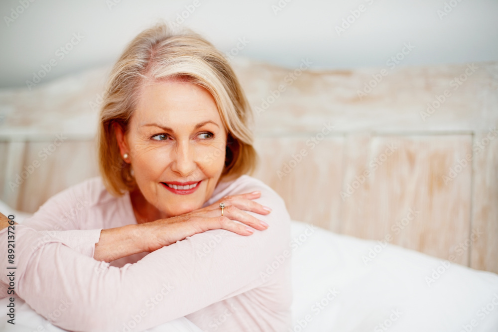 Mature woman, thinking and relax on bed in hotel on holiday for retirement, leisure and wellness. Female person, idea and comfort in bedroom at lodge while on vacation for peace, health and break Mature woman, thinking and relax on bed in hotel on holiday for retirement, leisure and wellness. Female person, idea and comfort in bedroom at lodge while on vacation for peace, health and break