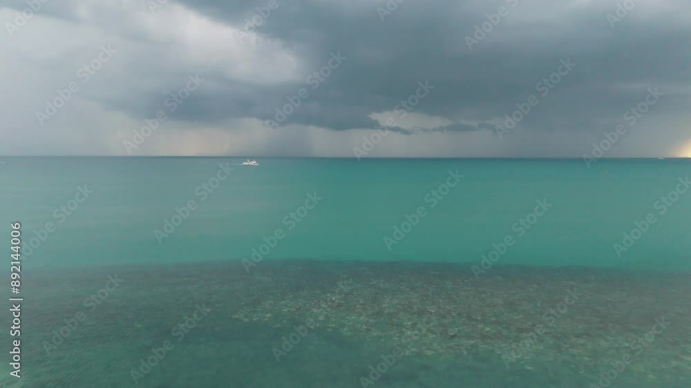 Distant yacht glides across turquoise ocean captured from aerial view beauty of seascape serene journey of boat. Tranquil beauty of turquoise ocean frames yacht sailing gracefully in distance. Distant yacht glides across turquoise ocean captured from aerial view beauty of seascape serene journey of boat. Tranquil beauty of turquoise ocean frames yacht sailing gracefully in distance.