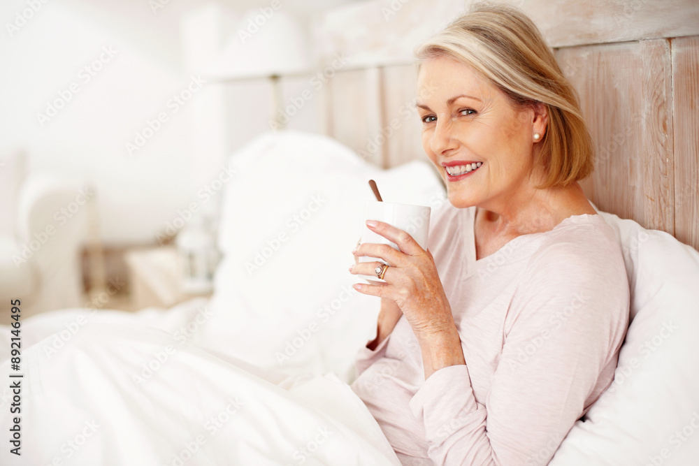 Elderly woman, happy and drinking tea in bedroom for relax or comfort on weekend with break, rest and reflection. Senior, female person and remembering in thinking, morning routine and memory in home Elderly woman, happy and drinking tea in bedroom for relax or comfort on weekend with break, rest and reflection. Senior, female person and remembering in thinking, morning routine and memory in home