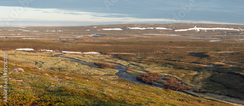 Vast landscape near Gomagvær in Varanger Peninsula on a beautiful summer night during the nightless night photo
