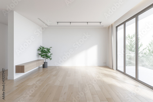 Residential empty room interiors with no furniture, natural lighting and ample copy space. Mockup interiors conceptual image. © JuanM