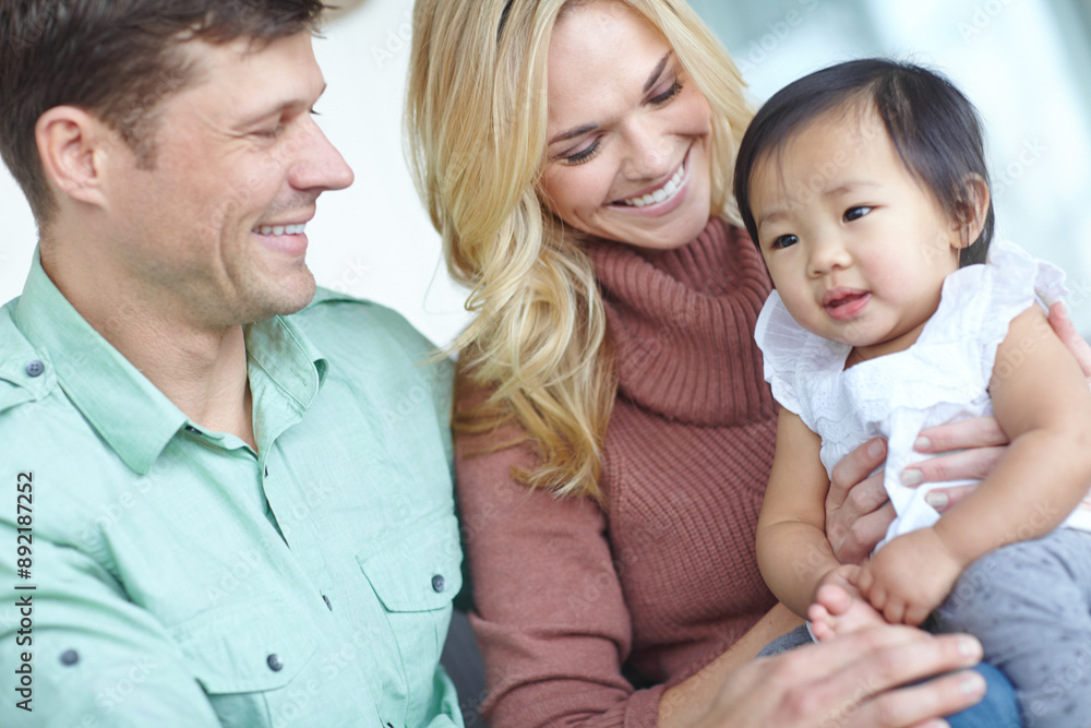 Happy family, parents and adopted baby in home for custody, support and bonding together. Mother, kid and father with cute foster child for connection, orphan and interracial care with toddler Happy family, parents and adopted baby in home for custody, support and bonding together. Mother, kid and father with cute foster child for connection, orphan and interracial care with toddler