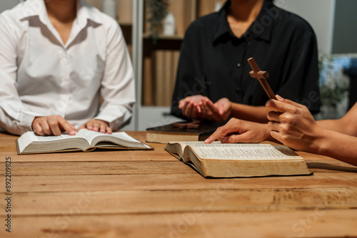 A person reads the Bible, embodying faith and spirituality. The scene reflects a serene moment of contemplation and devotion, highlighting the importance of religion in everyday life.