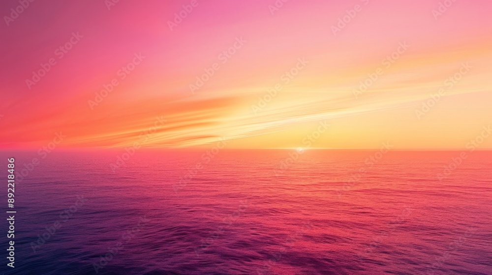 A serene sunset with smooth gradient colors blending from pink to orange over a calm ocean. A serene sunset with smooth gradient colors blending from pink to orange over a calm ocean.