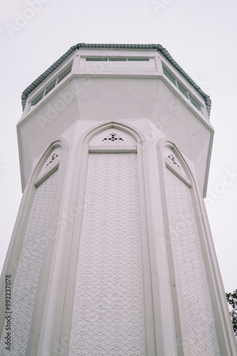 Bogor, Juy 21 2024. The minaret of the Great Mosque of Bogor rises majestically, showcasing intricate architecture and spiritual significance. photo