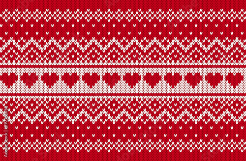 Knit Christmas pattern with hearts. Knitted sweater texture. Xmas seamless background. Festive winter red print. Set of holiday fair traditional ornaments. Vector illustration.