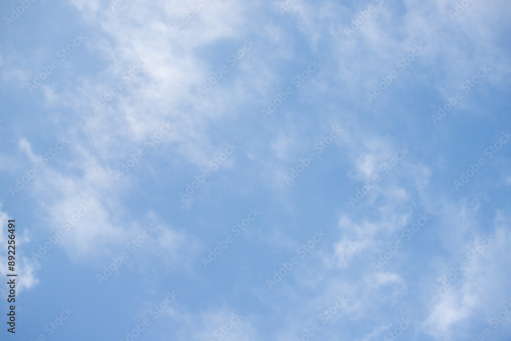 Sky background with clouds. White clouds against a blue sky. Sky background with clouds. White clouds against a blue sky.