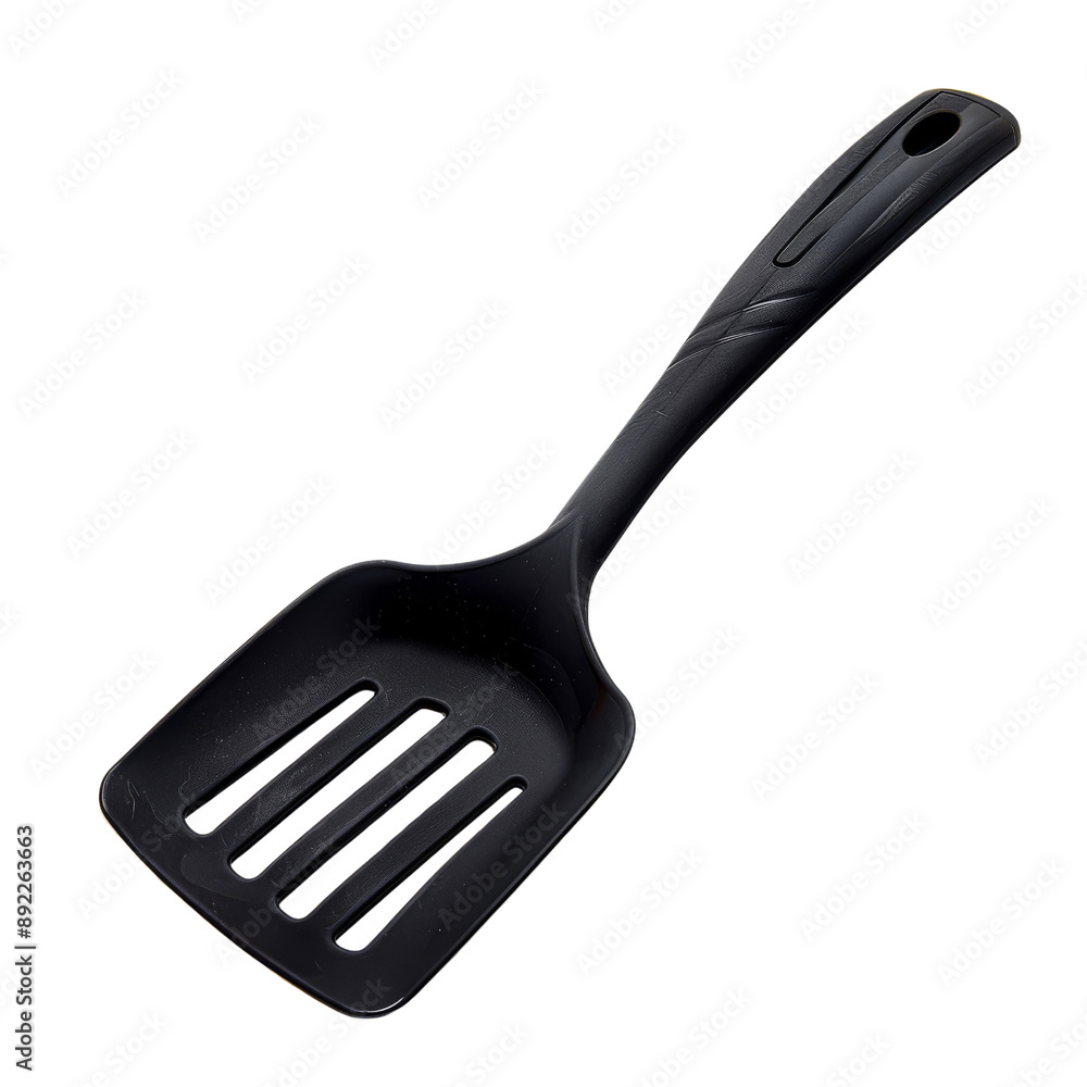 Black Cooking Spatula with Slotted Surface Isolated Without Background. Black Cooking Spatula with Slotted Surface Isolated Without Background.