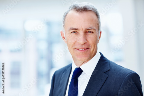 Smile, portrait and mature businessman in office with corporate finance broker company. Pride, happy and face of male financial ceo from New York with confidence for career growth in workplace.