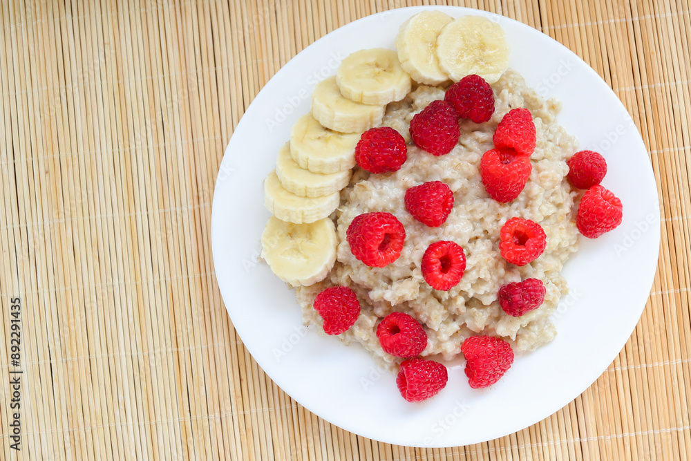 Oatmeal with pieces of raspberry and banana
Oatmeal with pieces of raspberry and banana