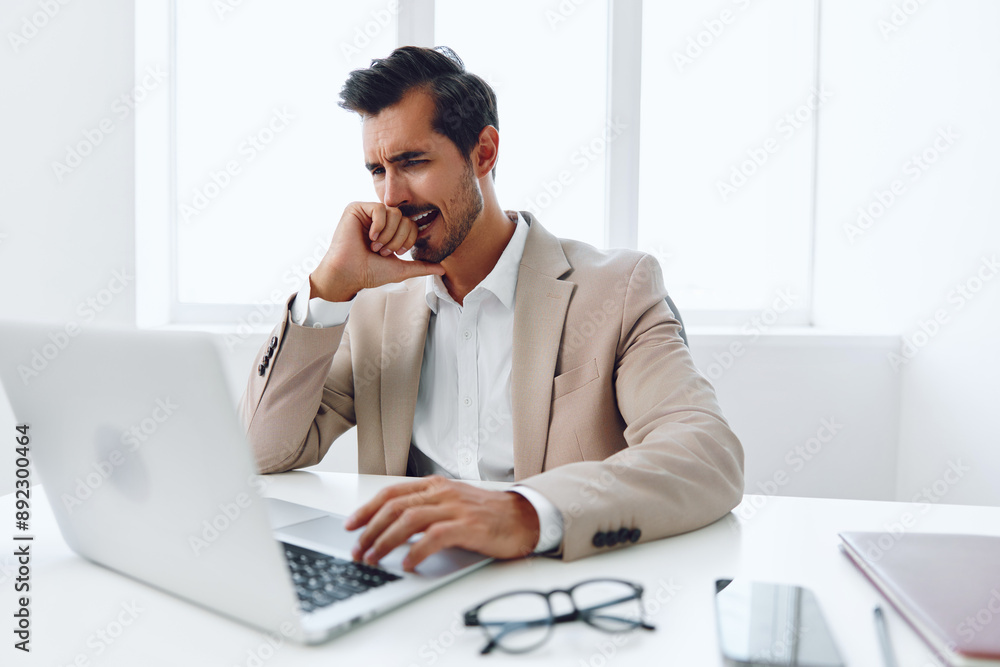 Man thinking working laptop employee office job desk glasses professional tired sitting business Man thinking working laptop employee office job desk glasses professional tired sitting business