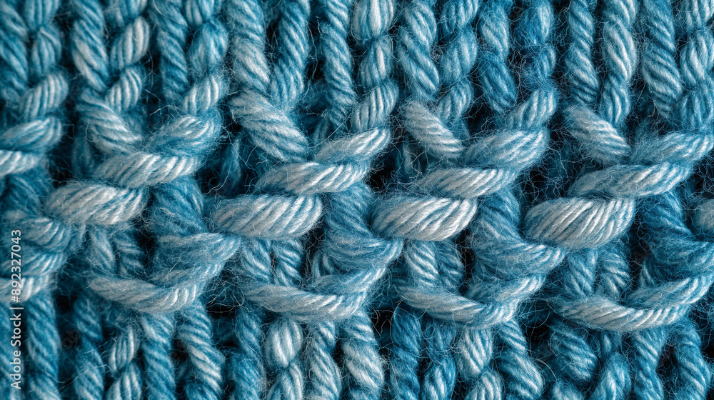 A blue and white yarn with a pattern of loops and knots A blue and white yarn with a pattern of loops and knots