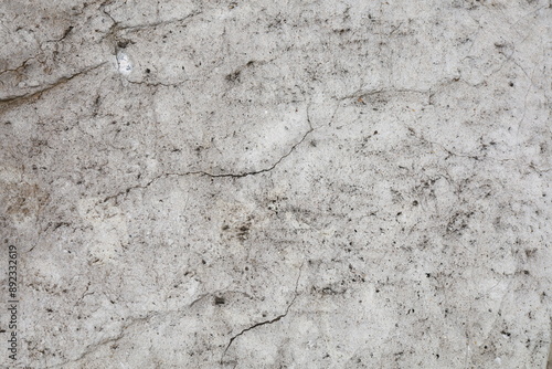 Gray stone wall texture background with rough, grunge surface