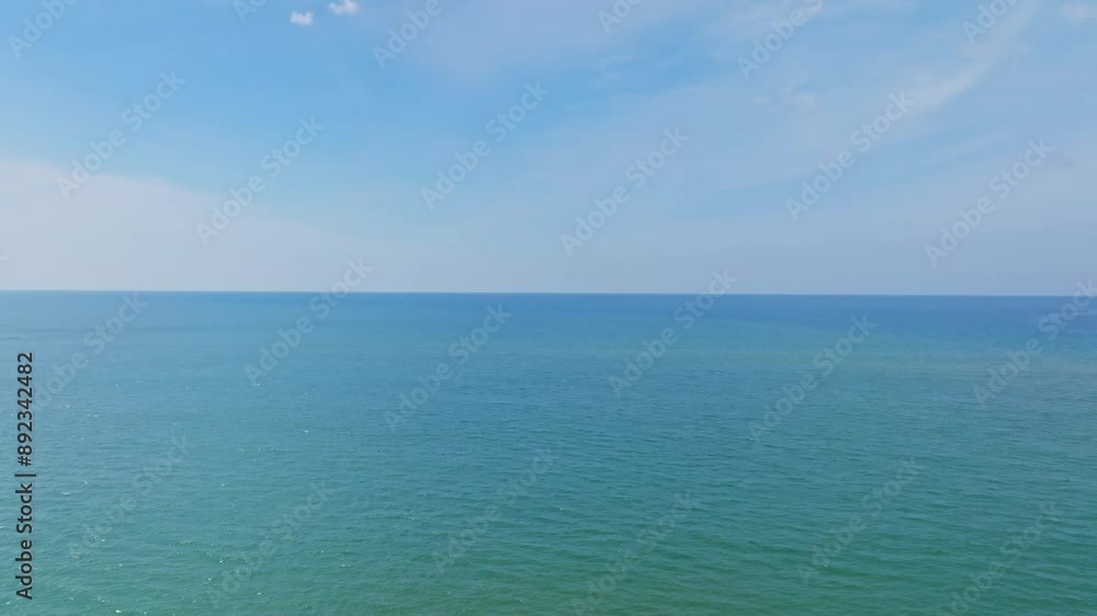 Beautiful Sea in summer season white clouds and blue sky background Beautiful Sea in summer season white clouds and blue sky background