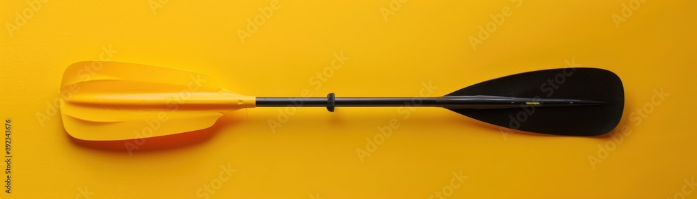 Modern Kayak Paddle with Detailed Blade and Handle on Yellow Background Modern Kayak Paddle with Detailed Blade and Handle on Yellow Background