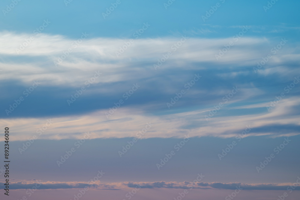 Fototapeta premium evening sky with clouds and rays of the sun, background