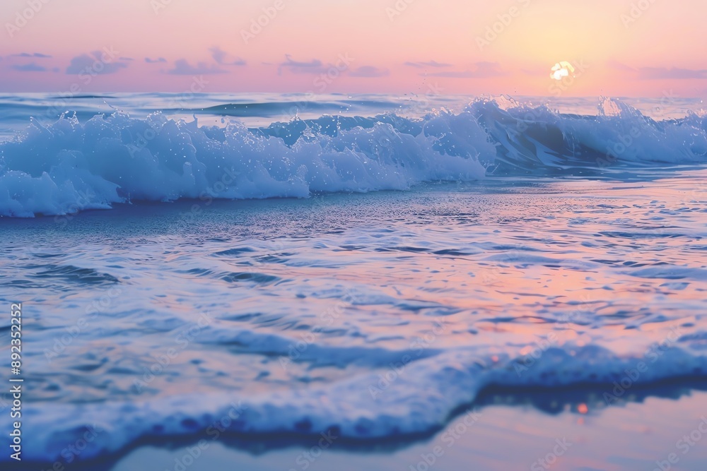 Obraz premium Soft, pastel-colored sunset over a serene ocean with gentle waves crashing on the shore.