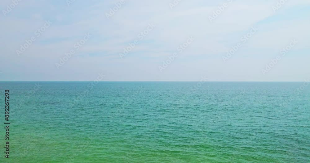 Beautiful Sea in summer season white clouds and blue sky background Beautiful Sea in summer season white clouds and blue sky background