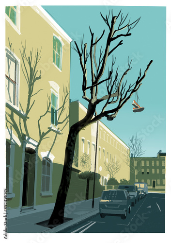 London street in the late afternoon with gang shoes in tree 