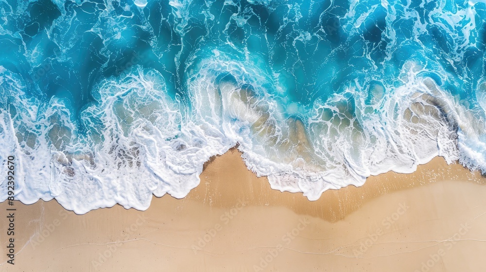 Blue ocean wave on sandy beach with space for text and design Blue ocean wave on sandy beach with space for text and design