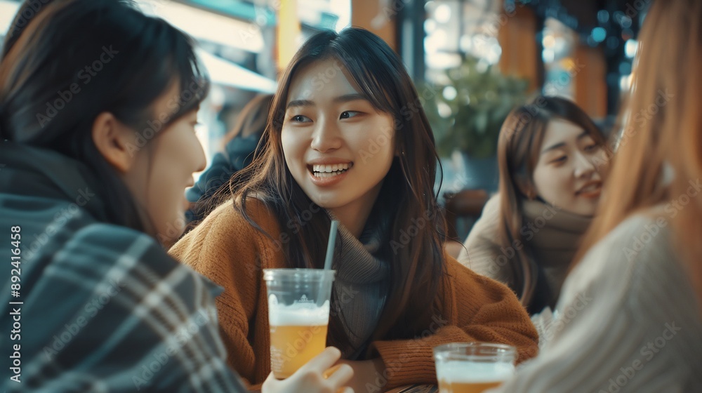 Smiling Girl with Friends at a Cafe Smiling Girl with Friends at a Cafe