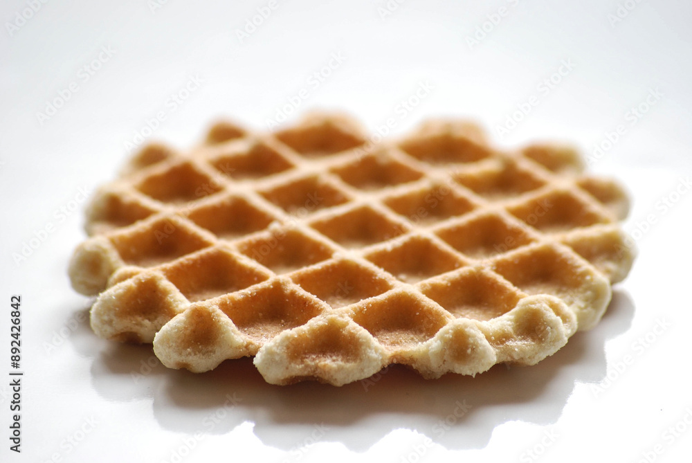 Macro close up shot of a sugar waffle Macro close up shot of a sugar waffle