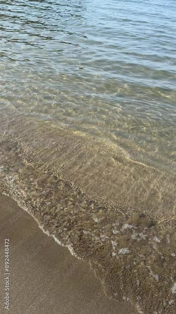 waves on the sand beach, vertical video. waves on the sand beach, vertical video.