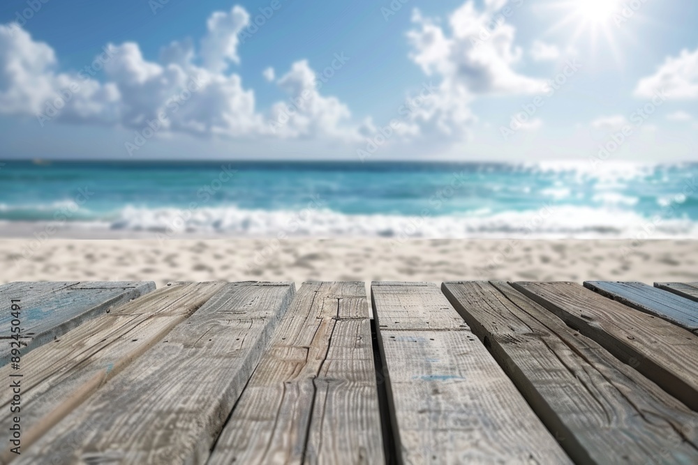 A wooden table situated on a sandy beach, overlooking the vast ocean A wooden table situated on a sandy beach, overlooking the vast ocean