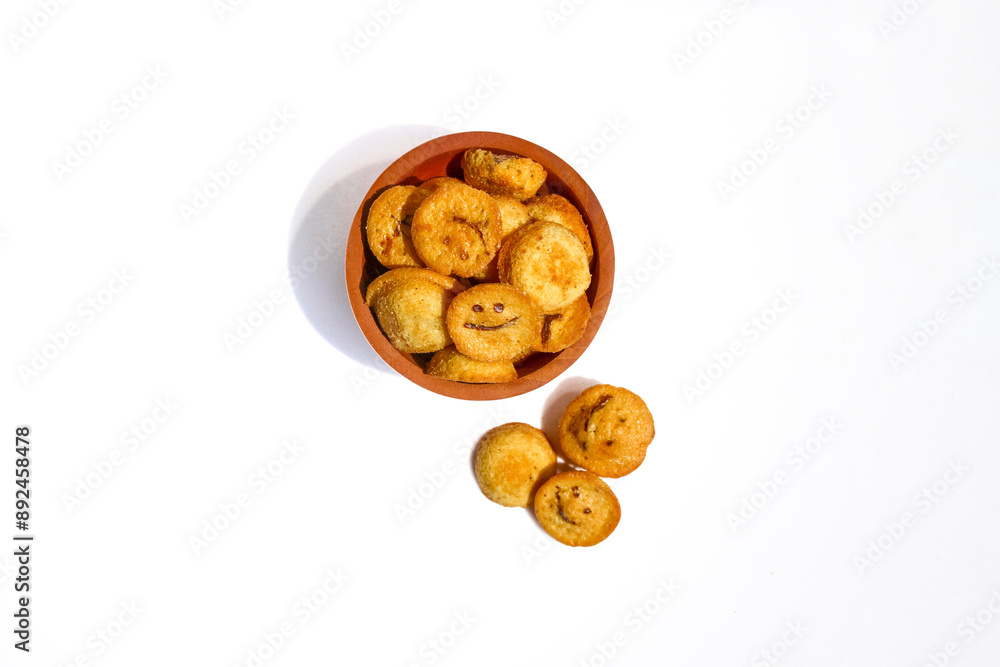 Kue bolu kering or Dried sponge cake in a small wooden bowl isolated on white background
Kue bolu kering or Dried sponge cake in a small wooden bowl isolated on white background