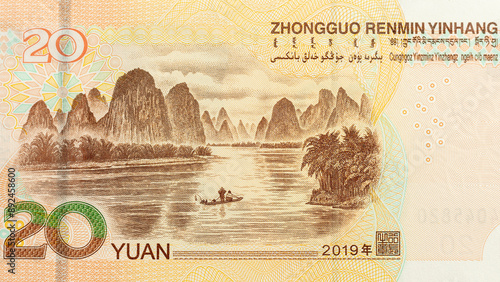 Landscape of the Li river as it passes through Guilin, Portrait from China 20 Yuan 2019 Banknotes photo