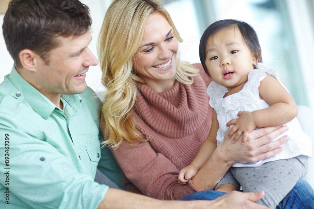 Happy family, parents and portrait of foster baby child in home for care, support and bonding together. Mother, father and face of cute adopted kid for connection, diversity and interracial love Happy family, parents and portrait of foster baby child in home for care, support and bonding together. Mother, father and face of cute adopted kid for connection, diversity and interracial love