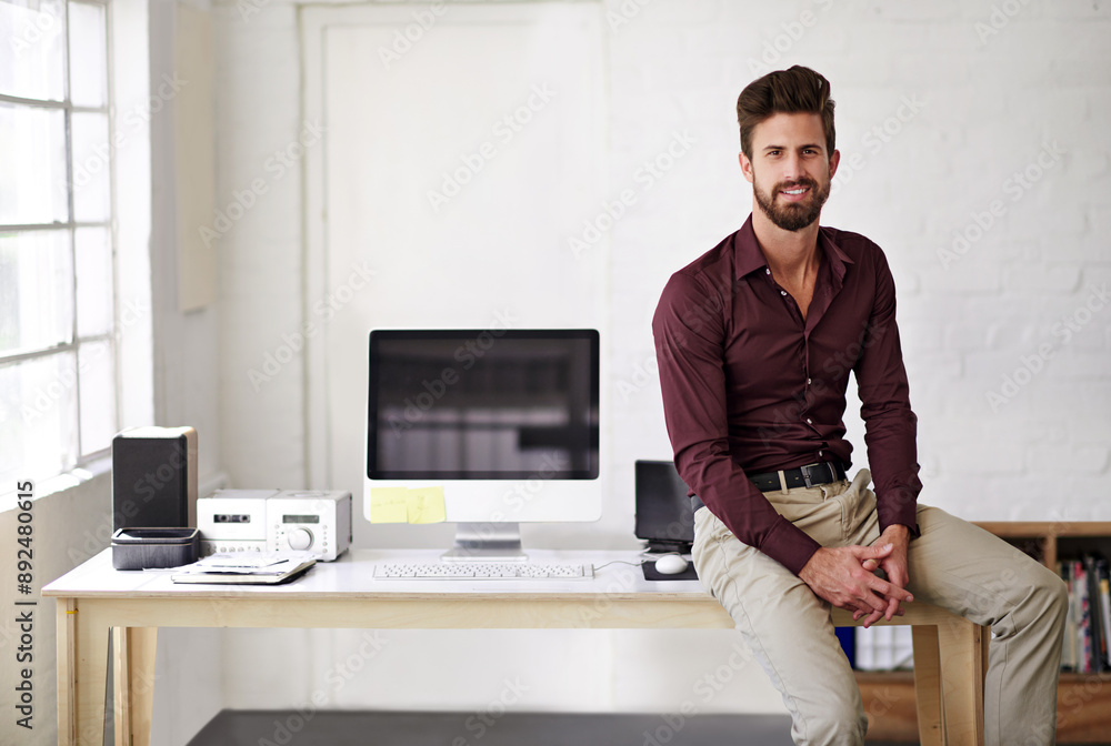 Computer, desk and portrait of programmer man in office for administration of creative development. Business, design and technology with website developer in professional workplace for IT support Computer, desk and portrait of programmer man in office for administration of creative development. Business, design and technology with website developer in professional workplace for IT support