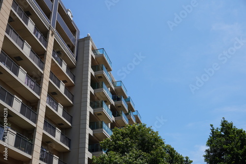 Photographs of apartment(condominium) buildings. The photograph is designed for composition and perspective.
