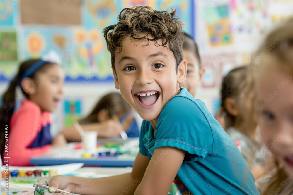 Portrait of a happy boy in art class at school