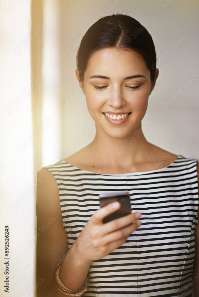 Texting, woman and happy at office with smartphone for communication, networking and good news. Business, female employee and smile or confident as real estate agent on property website for sale Texting, woman and happy at office with smartphone for communication, networking and good news. Business, female employee and smile or confident as real estate agent on property website for sale