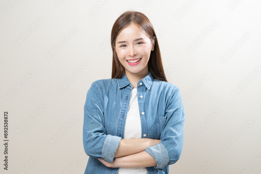 Smile positive, happy asian young woman, girl in casual, portrait of beautiful female with long hair feeling prond, standing crossed arms looking at camera, isolated on white background, copy space. Smile positive, happy asian young woman, girl in casual, portrait of beautiful female with long hair feeling prond, standing crossed arms looking at camera, isolated on white background, copy space.