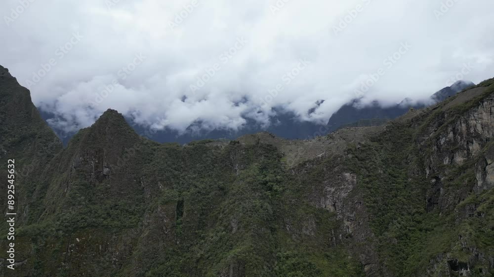 Aerial video of Historic Sanctuary of Machu Picchu around vacant ancient ruins, Peru. Aerial video of Historic Sanctuary of Machu Picchu around vacant ancient ruins, Peru.