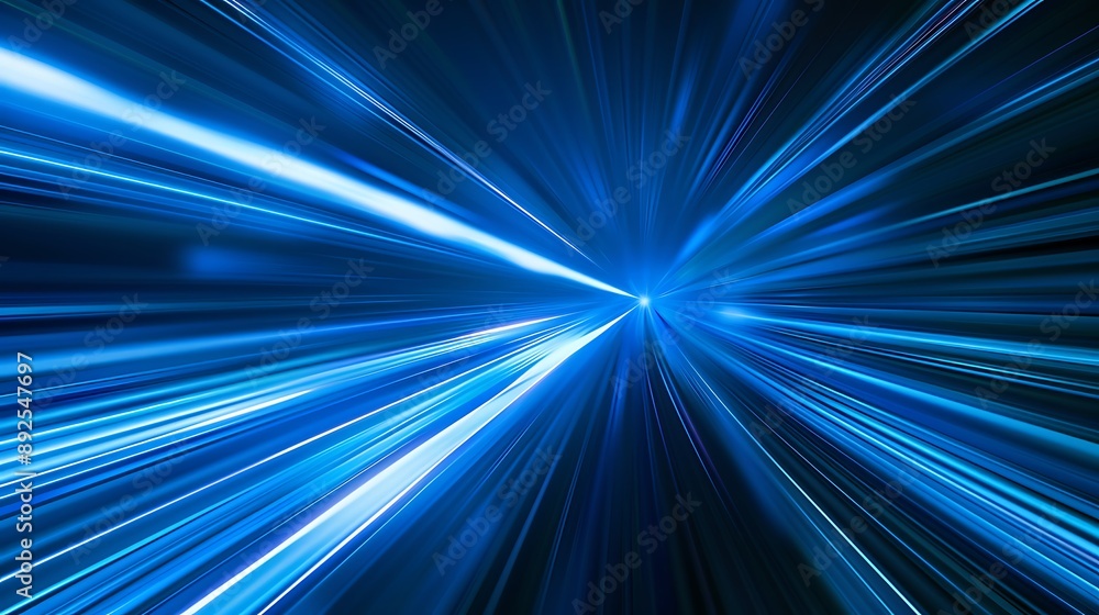 Abstract, science futuristic energy technology concept of light rays stripes lines with blue light speed and motion blur over dark blue background Abstract, science futuristic energy technology concept of light rays stripes lines with blue light speed and motion blur over dark blue background
