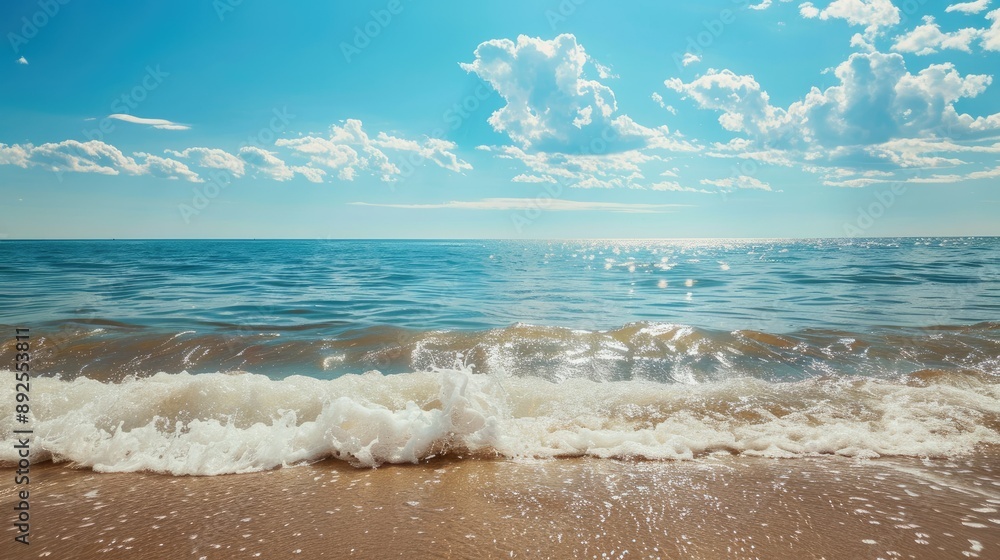 Calm sea beach with gentle waves and a bright blue sky Calm sea beach with gentle waves and a bright blue sky