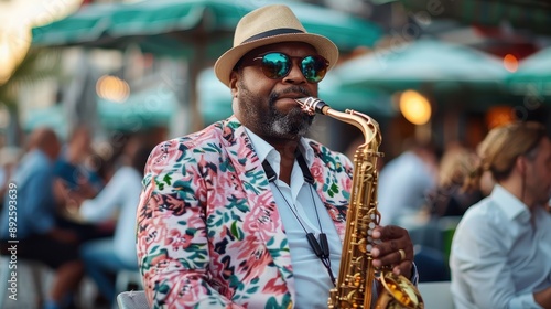 A musician clad in a floral-patterned jacket and hat is seen playing the saxophone outdoors, surrounded by a lively and colorful backdrop of a busy cafe scene.