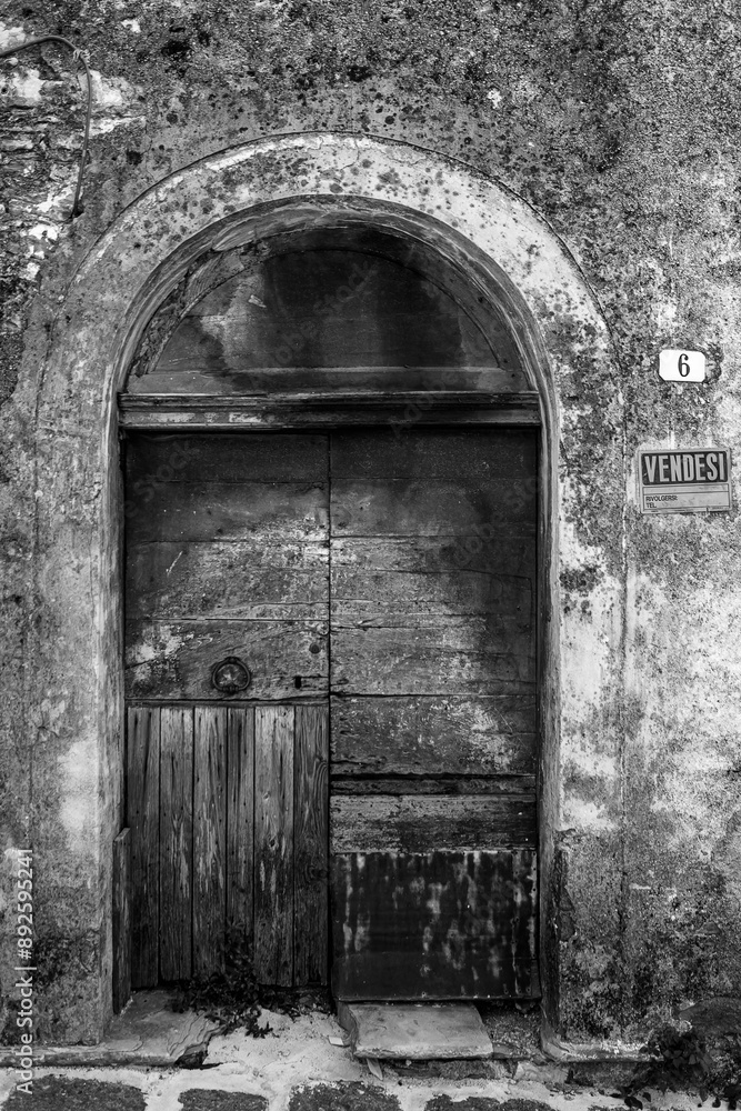 an old entrance door of a typical historic house in Roccamandolfi an old entrance door of a typical historic house in Roccamandolfi