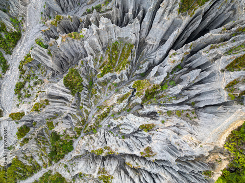 Obraz na plátně Aerial top down view of the clay cliff erosion phenomenon in the Putangirua Pinnacles, New Zealand