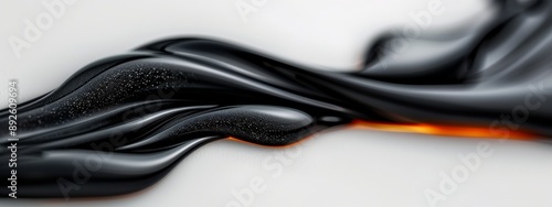  A tight shot of a liquid on a white backdrop, featuring a black and orange substance at its center
