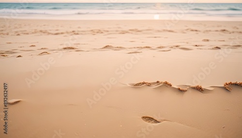 Close up sand with blurred sea sky background, summer day, copy space or for product. Summer background concept.