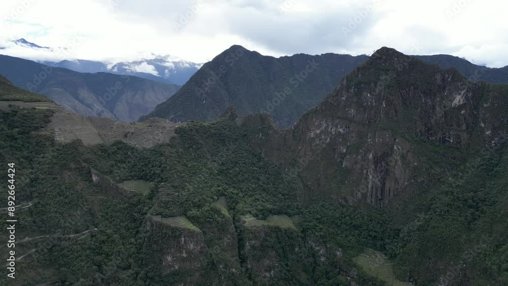 Aerial video of Historic Sanctuary of Machu Picchu around vacant ancient ruins, Peru. Aerial video of Historic Sanctuary of Machu Picchu around vacant ancient ruins, Peru.