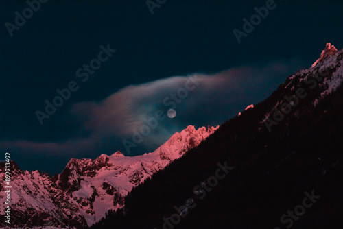 full moon in alps on the sunset photo