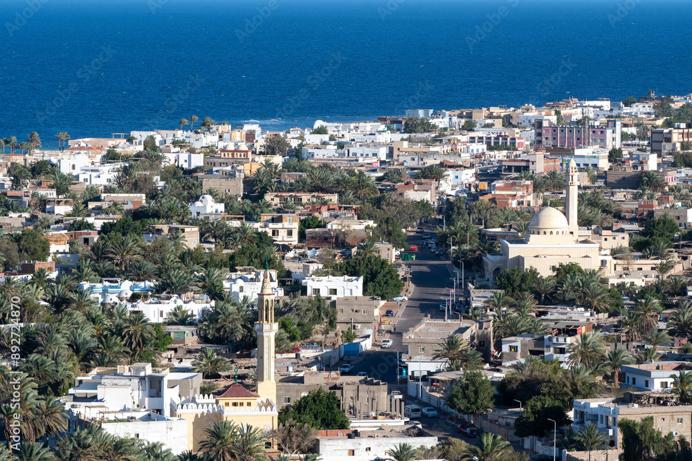 View of Dahab from viewpoint in the mountains on sunny day, Egypt.